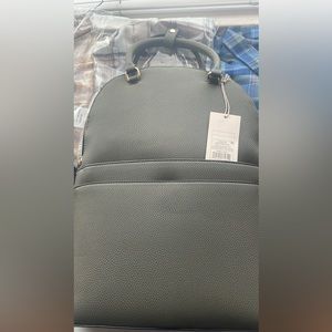 A new day green backpack